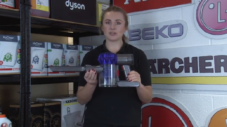 Clean the back of your tumble dryer with a vacuum.