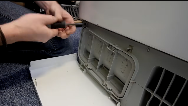 Refit the panel screws.