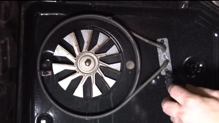 Remove the three screws from around the oven element.