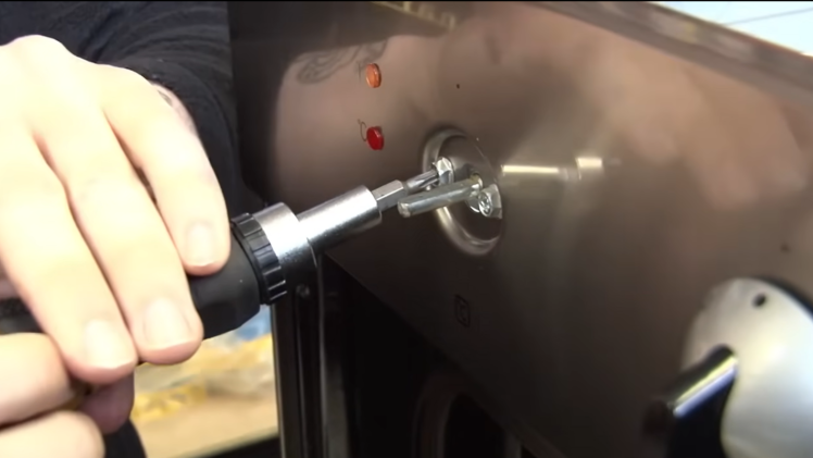 Remove control knob screws.