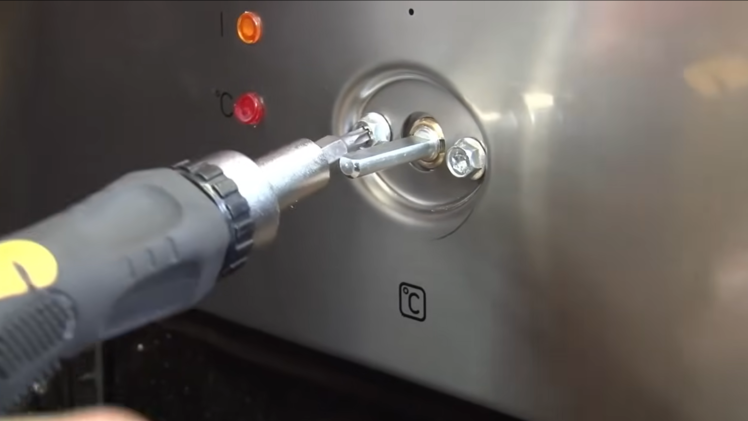 Refit the control knob screws.