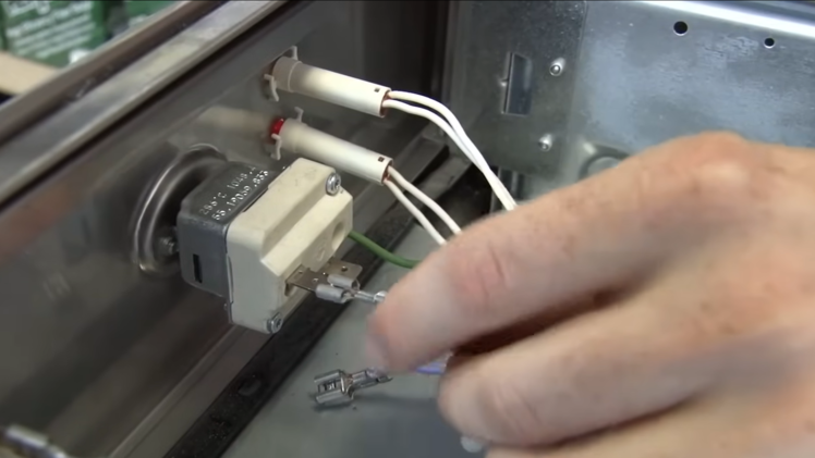 Refit the wires on the thermostat control.