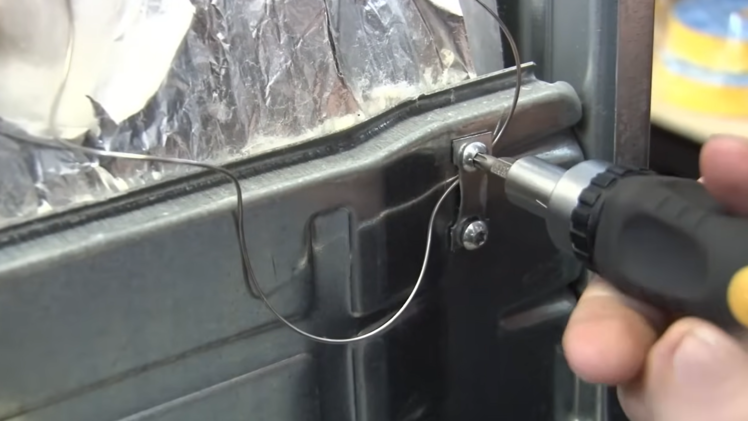 Refit the fixing bracket.