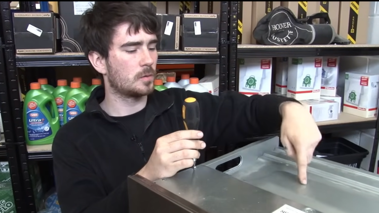 Remove the top panel screws.